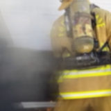 Fire fighter in action.